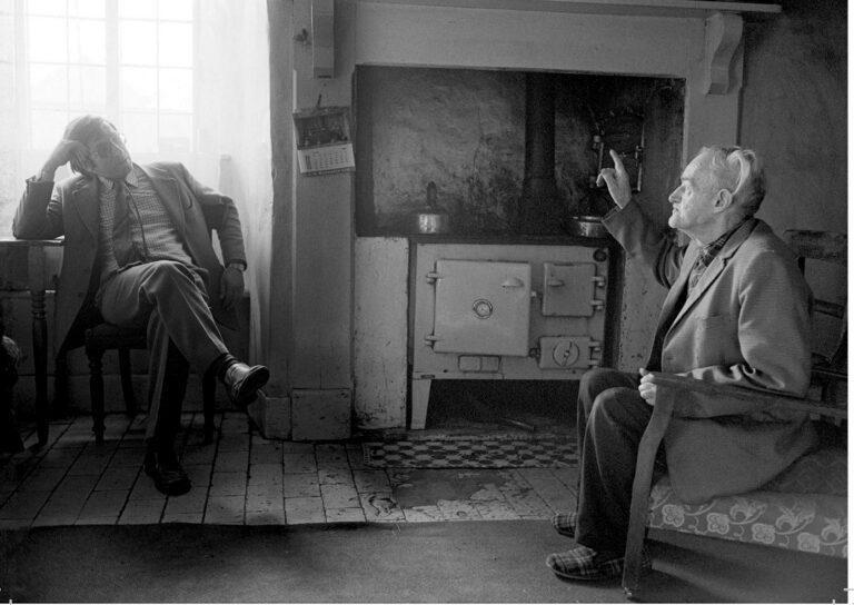 Dr Paul Bangay visiting an elderly man at this home, Merton, 1981